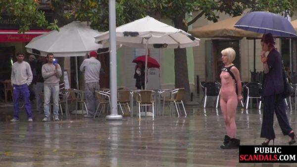 Public perverted naked slut seduced by BDSM lady outdoor on allbdsmporn.com